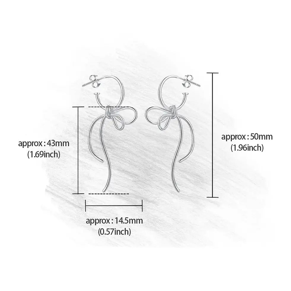 Schéma des dimensions des boucles d’oreilles volutes argent et or, indication des tailles et proportions.