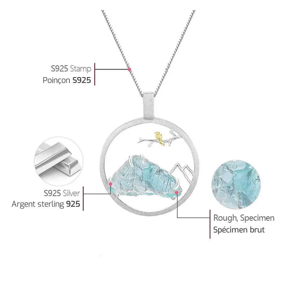 Schéma explicatif du Médaillon Envol du Sommet indiquant l’argent sterling 925, la finition dorée et la pierre brute.